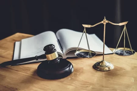 depositphotos_252067566-stock-photo-judge-gavel-with-scale-of